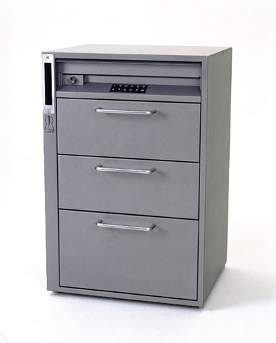 Caisse temporisée à trois tiroirs